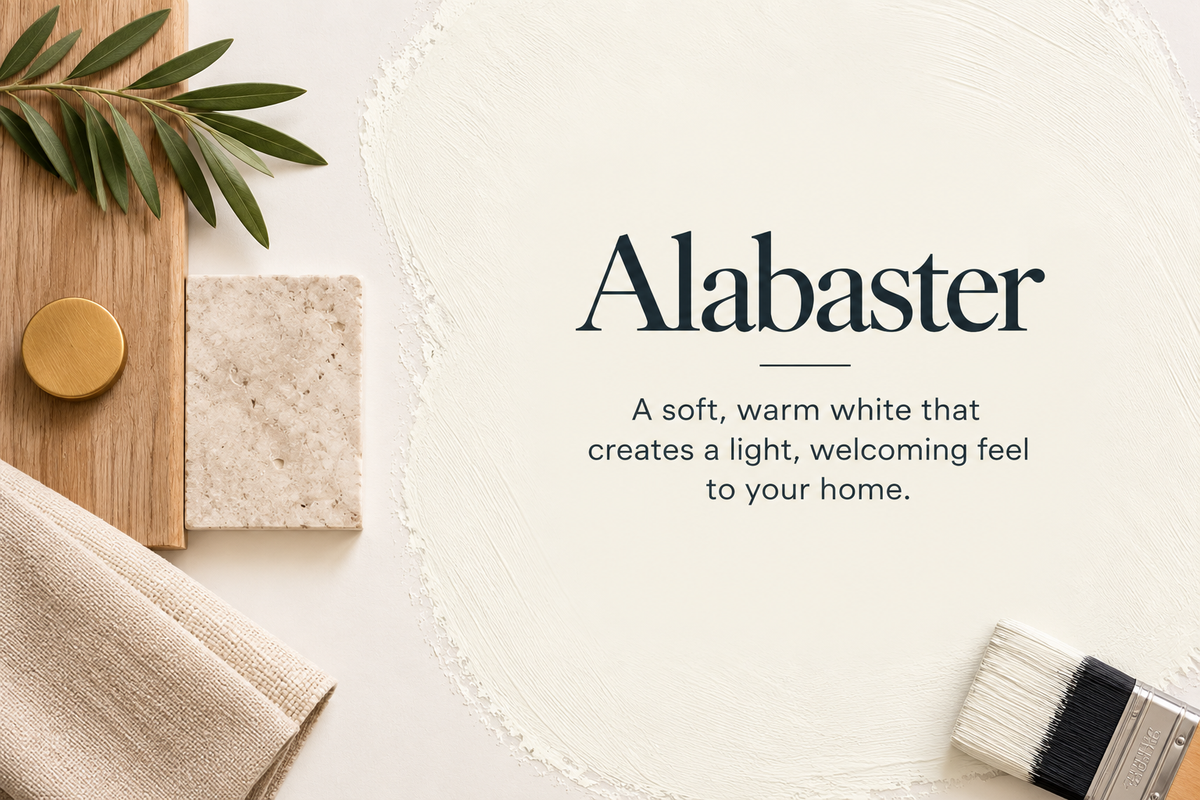 Sherwin-Williams Alabaster warm white paint color with natural wood, stone, and neutral fabric materials
